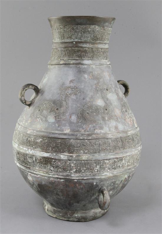 A Chinese archaic bronze ritual drinking vessel, Hu, 6th century B.C., 31cm